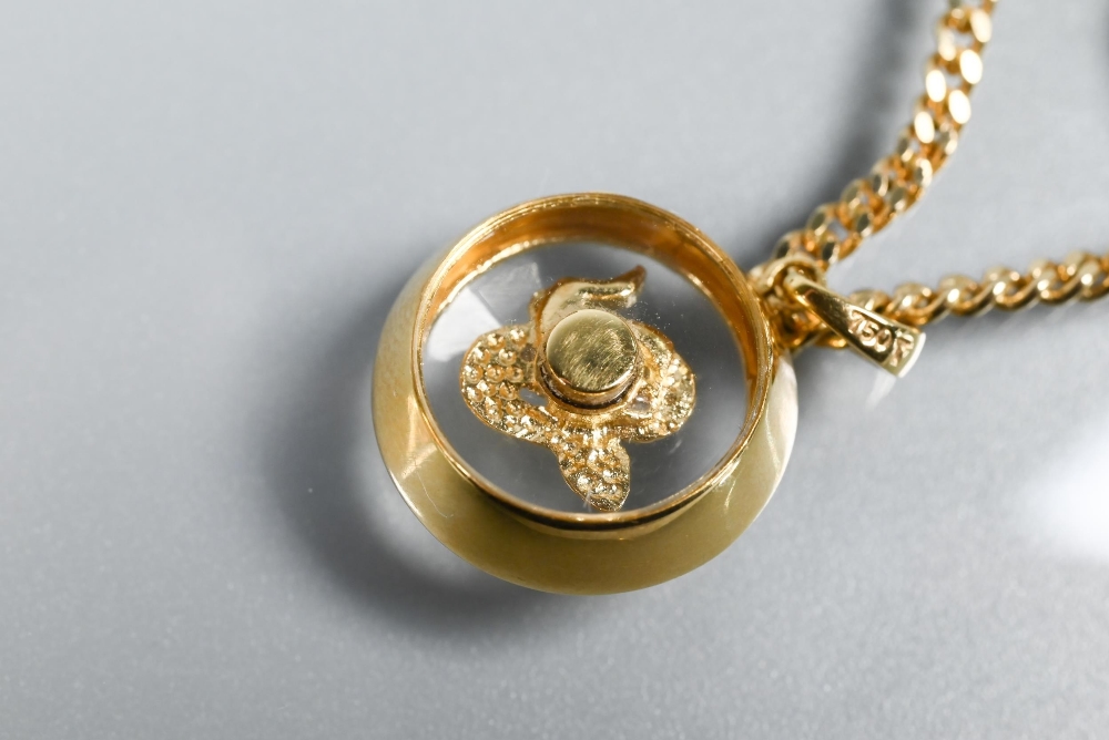 A Chopard-style 'Happy' snake pendant with rotating diamond-set serpent within, yellow metal stamped - Image 4 of 5