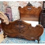 An antique French kingwood bedstead, with mattress + base (marks to mattress) 200 cm x 172 cm, the