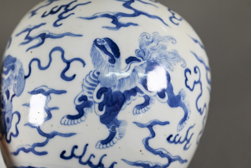 A pair of 19th century Chinese blue and white ginger jars and covers, each painted in rich tones - Image 6 of 10