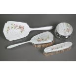 A silver and bas-taille enamel brush set, finely painted with blossoms and  comprising two