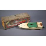 A boxed tinplate Hornby speed boat lightly played-with (box stained)