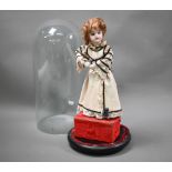 An antique French Jumeau bisque doll automaton by L Lambert, standing and drinking tea, 34 cm