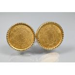 A pair of Persian coin-set cufflinks in yellow metal mount with swivel backs, stamped 750, 2.3 cm