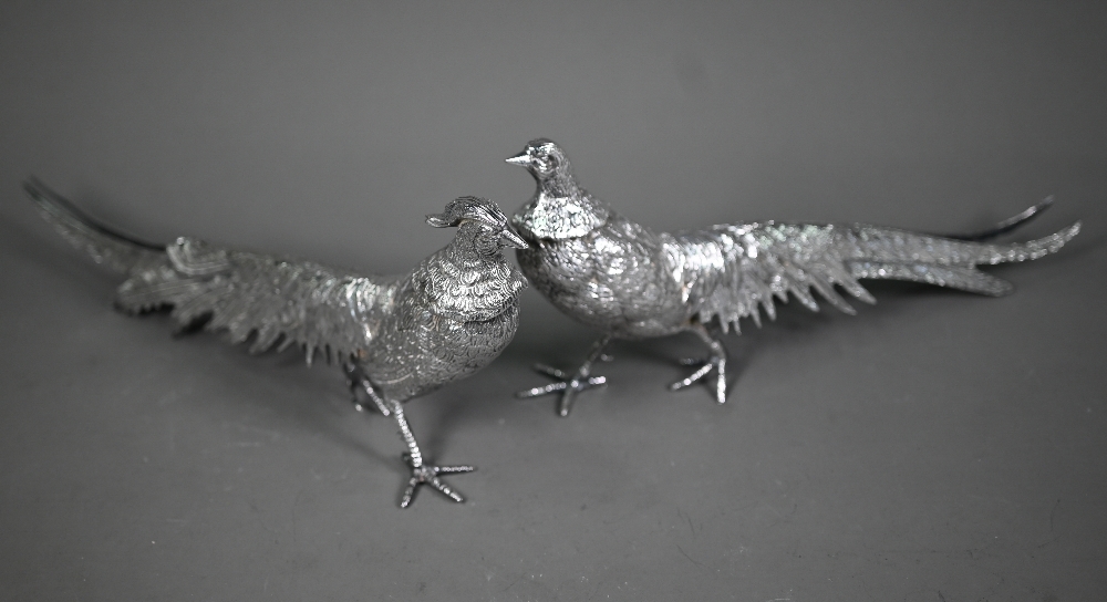 Two silver-plated pheasant table-ornaments, 30 cm long