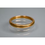 A 22ct yellow gold wedding band, size T 1/2, approx 5.1g