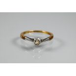 A single stone diamond ring, the old cut circular diamond in yellow and white metal shank stamped