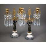 A fine pair of French Empire bronze, ormolu and marble crystal lustre drop two branch candelabra,