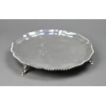 George III silver letter salver with moulded and gadrooned rim, on three hoof feet, Ebenezer