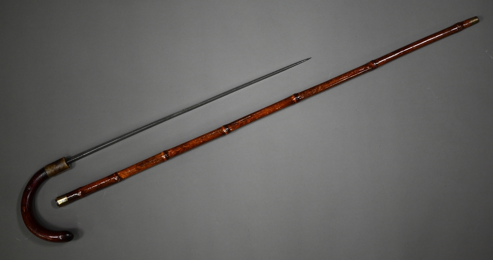 A late 19th century sword stick with hoop handle within a bamboo scabbard to/w an oriental silver - Image 4 of 4