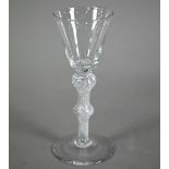 A Georgian cordial glass with tapering bowl on double knop air-twist stem with dome foot, 15 cm