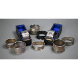 Pair of cased silver napkin rings, Birmingham 1922, to/w seven other silver napkin rings (9), 5.3oz