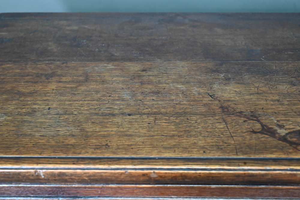 A 17th century jointed oak cupboard, with two moulded panelled doors over a full width drawer, - Image 7 of 10