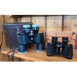A cased pair of Japanese 8 x 14 x 50 zoom binoculars to/w a cased pair of Vesper Optics 8 x 30 Field