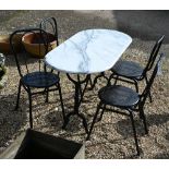 A marble top cafe style table to/w four chairs