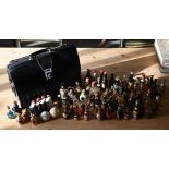 Collection of alcohol miniatures to/w a leather briefcase