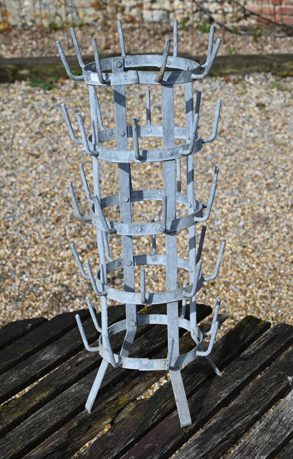 A vintage French galvanised five tier bottle drying rack