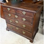 A George III mahogany chest of two short over three long graduated drawers, with brass fittings,