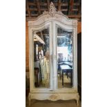 An antique continental distressed off-white painted double mirror doored knock down armoire, 130