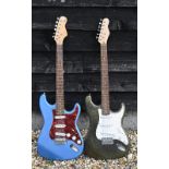 Two Stat-shape electric guitairs, one blue with Seymour Duncan pick ups and one gilttery green (2)