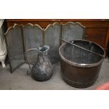 Antique rivetted brass log basket with iron handle to/w Middle Eastern engraved copper jug and