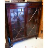 An astragal glazed mahogany bookcase, with glass shelves , raised on short cabriole legs, 88 cm x 32