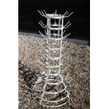 A vintage French metal eleven-tier wine bottle drying rack, cream painted finish, 94 cm high