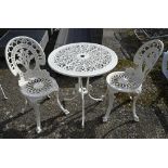 A Victorian style cast alloy five piece garden set comprising circular table and two chairs (3)