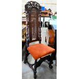 A 17th century style high-backed side chair