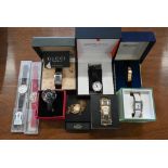 Nine various boxed fashion wristwatches