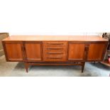 G-Plan, a large Fresco range teak sideboard, centred by four graduated drawers flanked to either