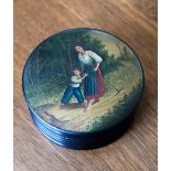 A Russian Imperial papier mache circular snuff-box in the manner of Lukutin Factory, the cover
