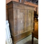 An antique Dutch oak two door knock-down armoire/wardrobe, the two doors with inlays, 170 cm x 63 cm