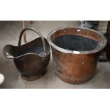 Antique rivetted copper log basket to/w copper helmet coal scuttle (2)