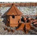 A wall mount wooden dovecote and bracket