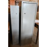 A grey steel three-gun cabinet, 21 x 21 x 123 cm high to/w a large grey steel gun cabinet (