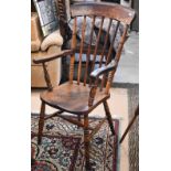 Antique provincial stained beech Windsor chair with elm seat, turned legs and stretchers