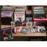 A large collection of 33 rpm vinyl records, including 1950s-80s rock, pop, easy listening and