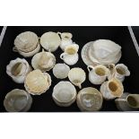 Twenty-five pieces of Belleek - various ages