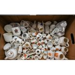 A collection of Goss and other crested china