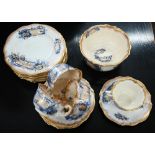 A 19th century Staffordshire china part tea service with underglaze blue and gilt decoration (20