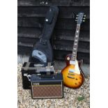 A 'Tokai Love Rock' Les Paul style electric guitar in 'CNB' soft gig-bag c/w a pathfinder 10