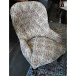Victorian button back open spoon-back armchair with beige floral upholstery