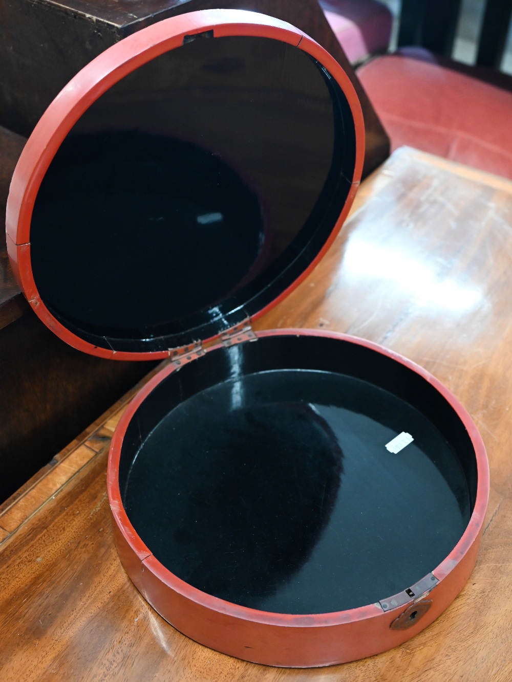 A Japanese red lacquer circular box with hinged cover and central black and gilt Kachio Ga panel, 28 - Image 5 of 5