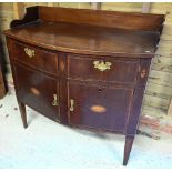 An antique inlaid mahogany demi-lune sideboard, with 3/4 galleried back over two short drawers and
