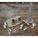 A pair of French gilt brass and mother of pearl opera glasses on telescopic handle by Iris of Paris,