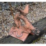 A cast terracotta dragon ridge tile (repaired wing)