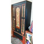 A floor standing hall cupboard painted with classical columns, birds and flowers, shelved