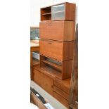 Five mid-century Danish design teak modular wall units comprising - two with sliding glass doors,