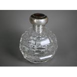 A globular cut glass scent bottle with hinged silver bun cover, Levi & Salaman, Birmingham 1916