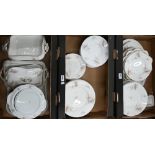An extensive set of Limoges floral-printed china dinner wares, (69 pieces - 3 boxes)